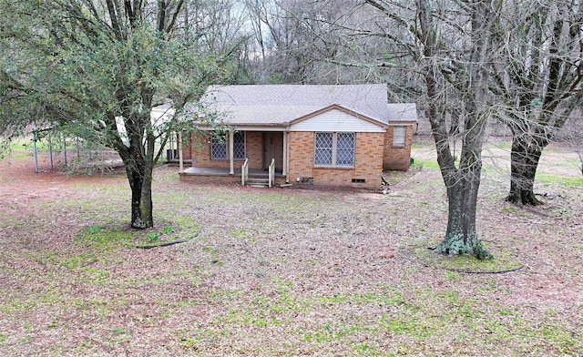 2431 N Jefferson, Mount Pleasant, TX 75455 - ranch-style home with a porch and brick siding
