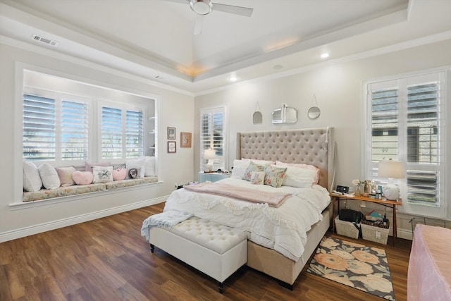 12265 Indian Creek Dr, Fort Worth, TX 76179 - bedroom with recessed lighting, a tray ceiling, visible vents, ornamental molding, and dark wood finished floors