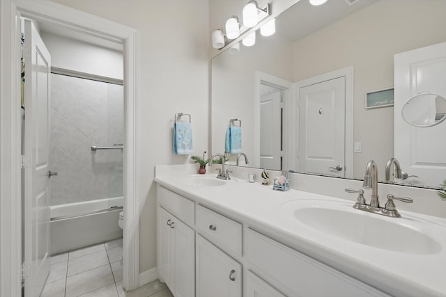 12265 Indian Creek Dr, Fort Worth, TX 76179 - full bathroom featuring tile patterned floors, toilet, enclosed tub / shower combo, and a sink