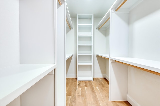 walk in closet featuring light wood-type flooring