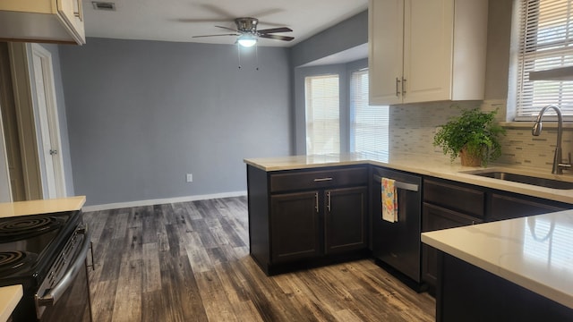 5919 Pleasant Hill Dr, Arlington, TX 76016 - kitchen featuring stainless steel dishwasher, a sink, a ceiling fan, dark wood-style flooring, and backsplash