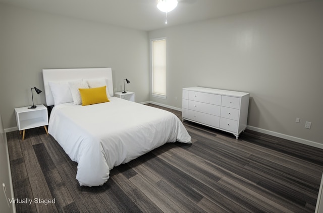 5919 Pleasant Hill Dr, Arlington, TX 76016 - bedroom featuring baseboards and dark wood finished floors