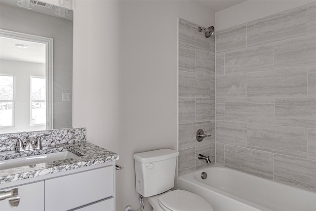 1405 S Freeway Freeway, Fort Worth, TX 76104 - full bathroom with toilet, shower / washtub combination, and vanity