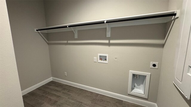 washroom with baseboards, washer hookup, laundry area, hookup for a gas dryer, and hookup for an electric dryer