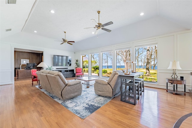 39 Lakeside Dr, Star Harbor, TX 75148 - living area with lofted ceiling, a decorative wall, light wood-type flooring, ceiling fan, and recessed lighting