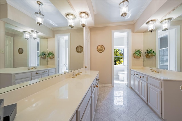 39 Lakeside Dr, Star Harbor, TX 75148 - full bathroom featuring toilet, two vanities, ornamental molding, baseboards, and tile patterned floors