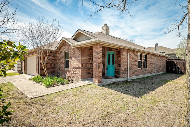 single story home with fence, an attached garage, a chimney, concrete driveway, and brick siding