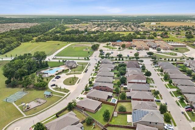 birds eye view of property with a residential view