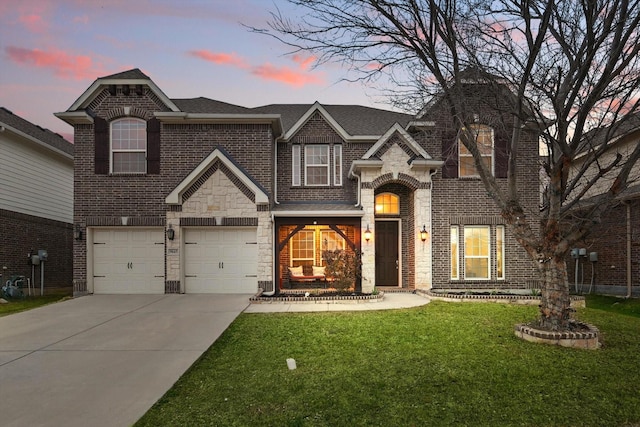 9645 Salvia Dr, Fort Worth, TX 76177 - view of front of home with concrete driveway, a garage, a yard, and brick siding