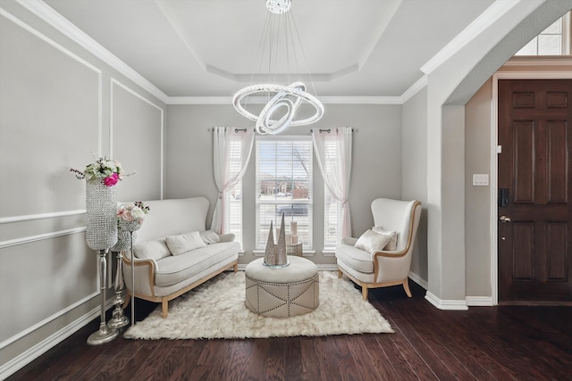 9645 Salvia Dr, Fort Worth, TX 76177 - living area featuring a raised ceiling, a chandelier, wood finished floors, and crown molding
