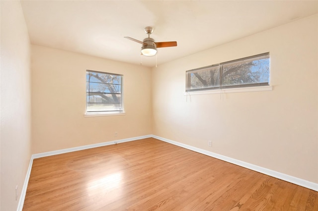 4021 Kenley St, Fort Worth, TX 76107 - empty room with a ceiling fan, light wood-type flooring, and baseboards