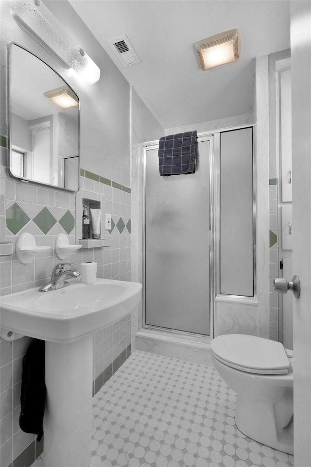 4021 Kenley St, Fort Worth, TX 76107 - full bathroom with visible vents, a shower stall, and tile walls