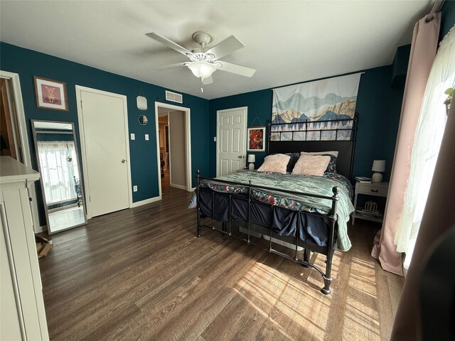 living room with wood finished floors and recessed lighting