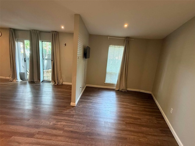5049 Cedar Springs Rd Unit 120, Dallas, TX 75235 - empty room featuring dark wood finished floors, baseboards, and recessed lighting