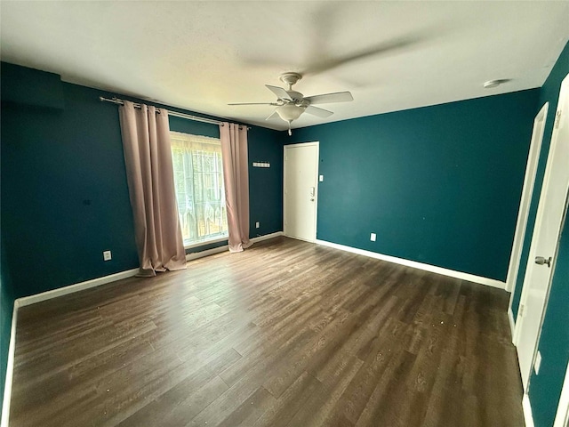 5049 Cedar Springs Rd Unit 120, Dallas, TX 75235 - spare room featuring a ceiling fan, wood finished floors, and baseboards