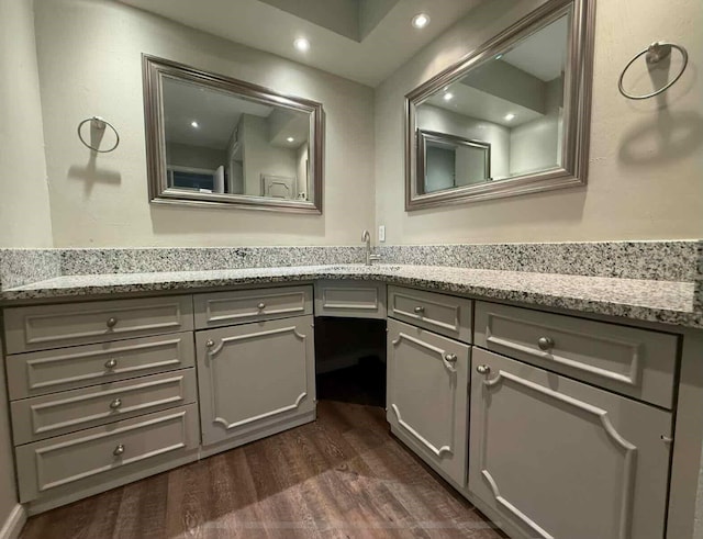 5049 Cedar Springs Rd Unit 120, Dallas, TX 75235 - bathroom featuring wood finished floors, vanity, and recessed lighting