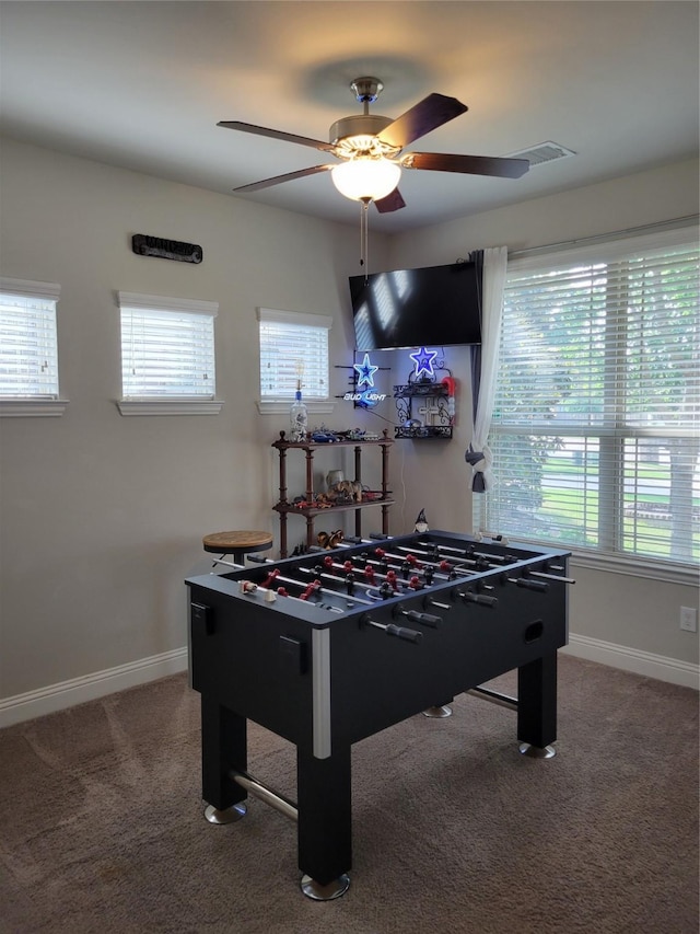 game room featuring visible vents, baseboards, carpet, and ceiling fan