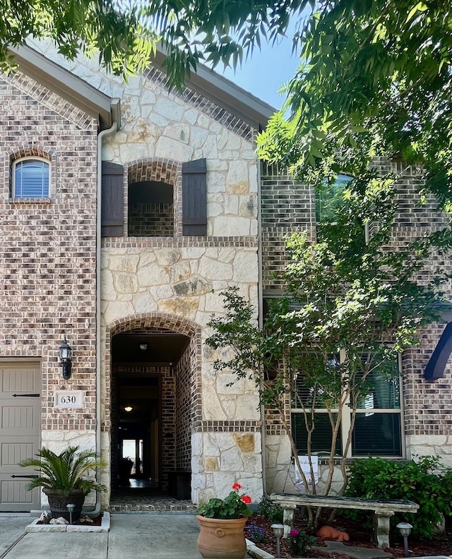 630 Warner Dr, Anna, TX 75409 - doorway to property with stone siding and brick siding