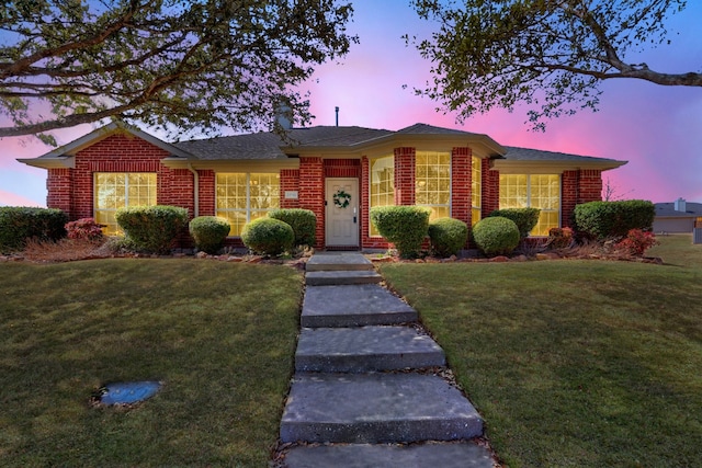 2710 Chalmers Ct, Rockwall, TX 75032 - view of front of house featuring a front yard and brick siding