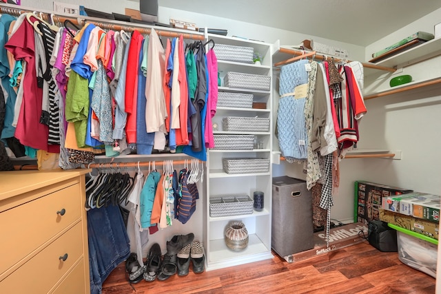 2710 Chalmers Ct, Rockwall, TX 75032 - spacious closet featuring wood finished floors