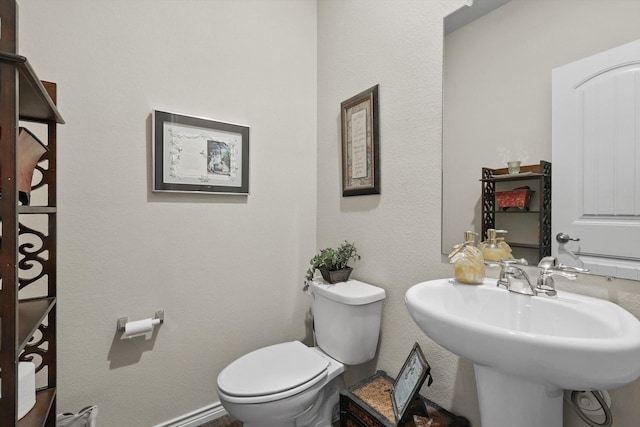 3013 Dominion St, Denton, TX 76209 - half bathroom with toilet and a sink