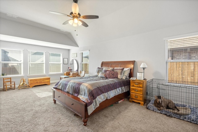 bedroom featuring visible vents, carpet, baseboards, ceiling fan, and vaulted ceiling