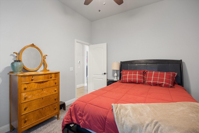 carpeted bedroom with baseboards and ceiling fan