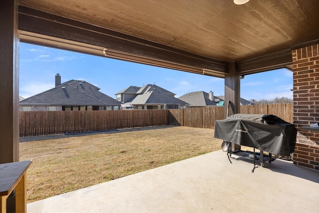 view of patio / terrace featuring grilling area and a fenced backyard