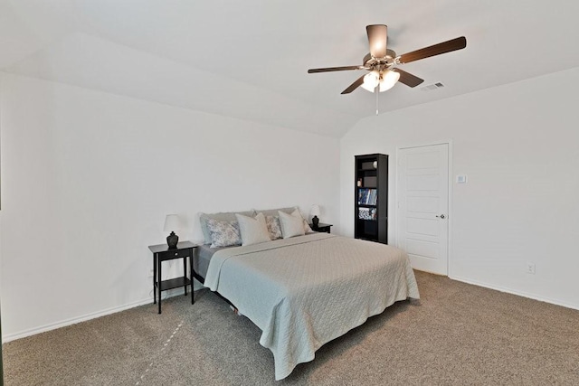 carpeted bedroom featuring visible vents, baseboards, a ceiling fan, and vaulted ceiling