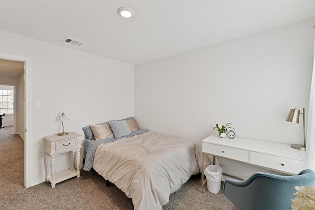 bedroom featuring visible vents and carpet