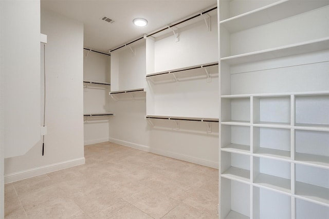 spacious closet with visible vents