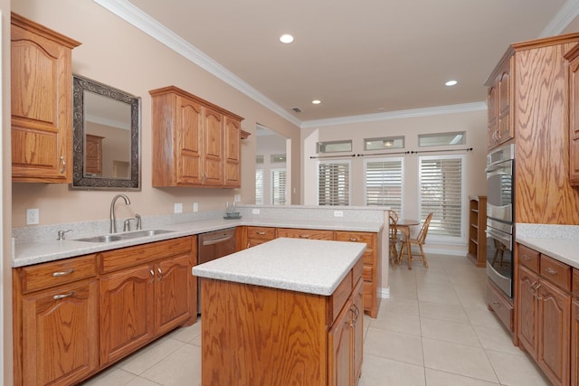 kitchen with a peninsula, light tile patterned flooring, ornamental molding, a sink, and light countertops