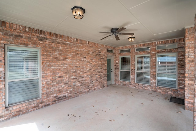 view of patio featuring ceiling fan