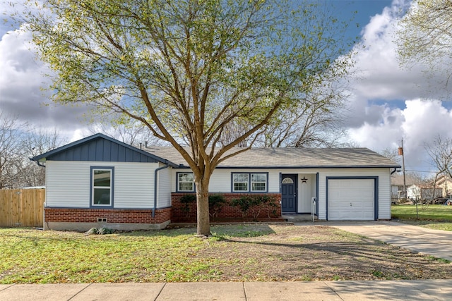 ranch-style house with driveway, fence, board and batten siding, an attached garage, and brick siding