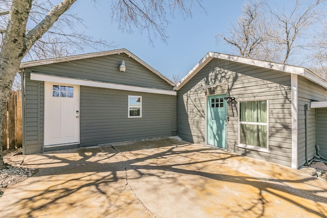 rear view of house featuring a patio area