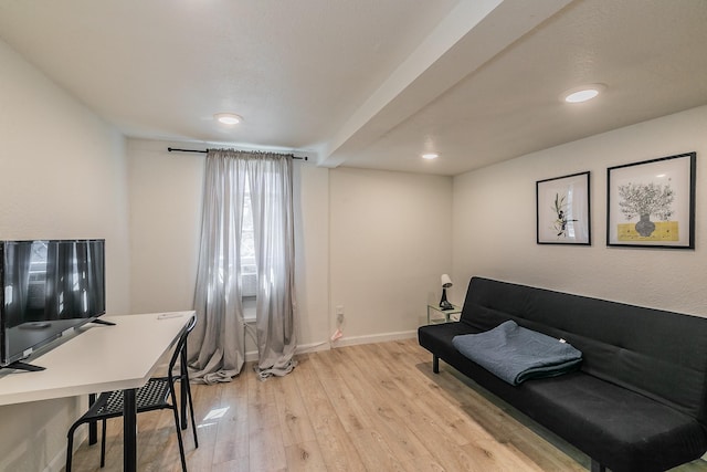 home office featuring recessed lighting, baseboards, and light wood finished floors