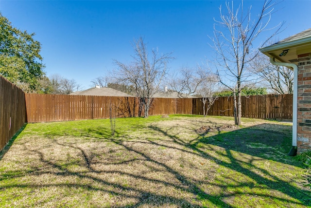 view of yard featuring a fenced backyard