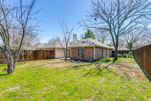 exterior space with a fenced backyard