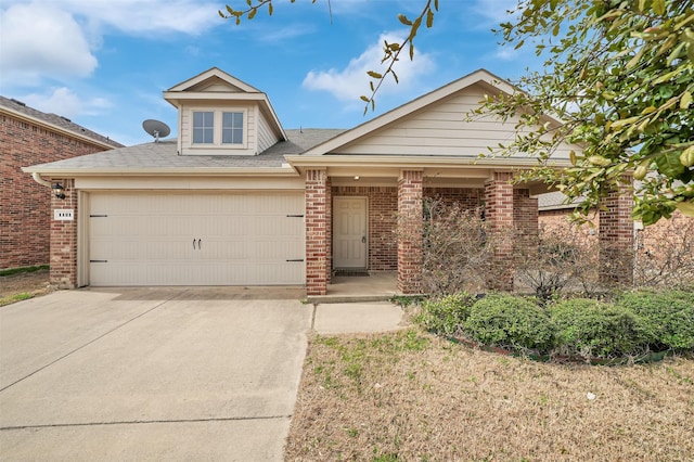 1121 Basswood Ln, Royse City, TX 75189 - view of front of house with a shingled roof, driveway, brick siding, and a garage