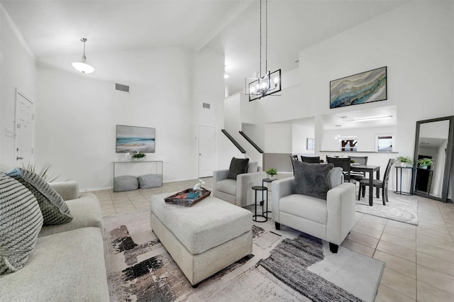 1121 Basswood Ln, Royse City, TX 75189 - tiled living area with visible vents, high vaulted ceiling, a notable chandelier, and stairs
