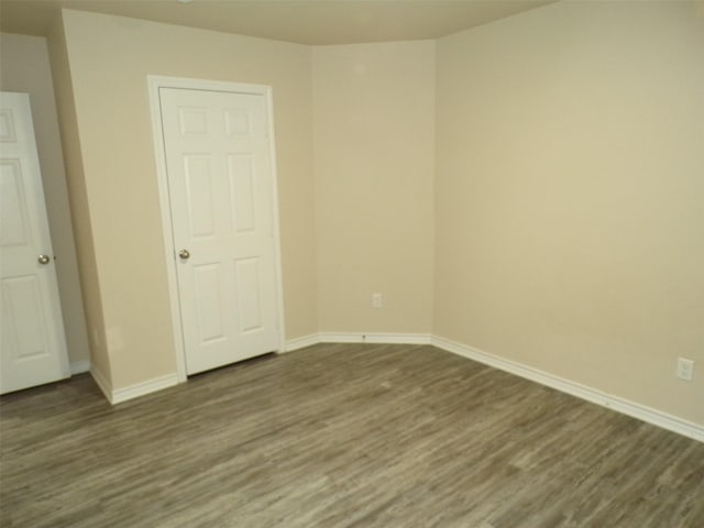 18287 County Road 4001, Mabank, TX 75147 - unfurnished room featuring wood finished floors and baseboards