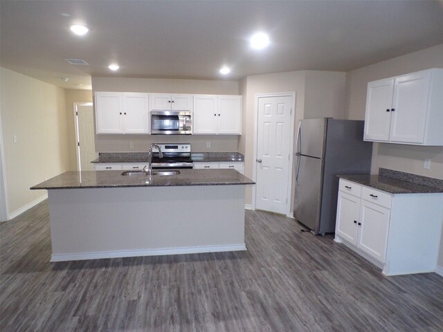 18287 County Road 4001, Mabank, TX 75147 - kitchen with appliances with stainless steel finishes, a sink, dark wood-style flooring, white cabinets, and recessed lighting