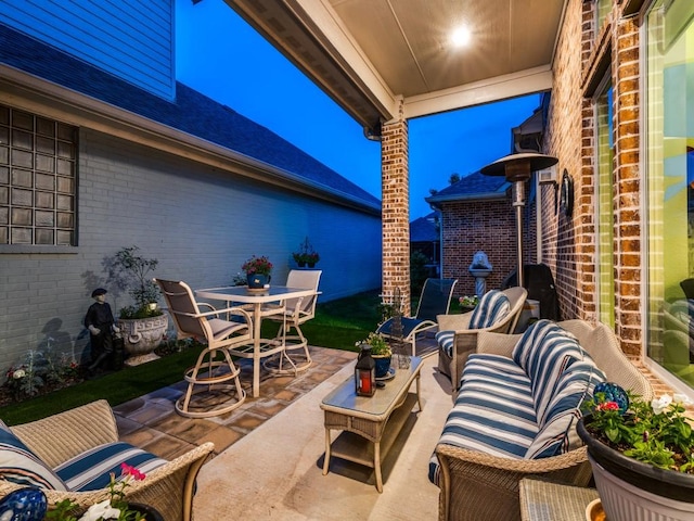 view of patio / terrace featuring an outdoor hangout area and outdoor dining area
