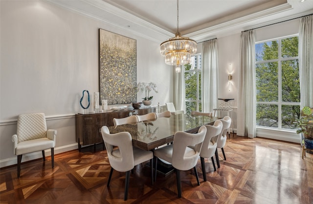 3401 Lee Pkwy Unit 3A, Dallas, TX 75219 - dining area with a chandelier, plenty of natural light, crown molding, a raised ceiling, and baseboards