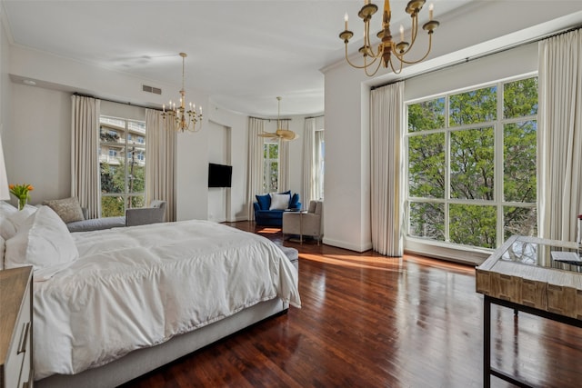 3401 Lee Pkwy Unit 3A, Dallas, TX 75219 - bedroom with a chandelier, wood finished floors, ornamental molding, and baseboards