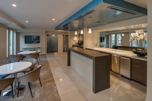 3401 Lee Pkwy Unit 3A, Dallas, TX 75219 - bar area with decorative light fixtures, recessed lighting, light tile patterned flooring, and dishwasher