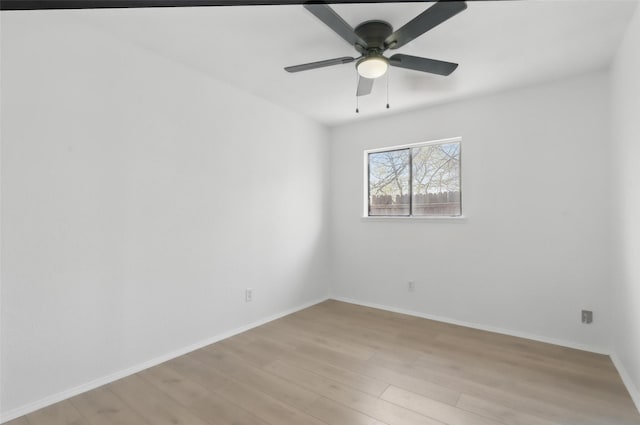1329 Steinburg Ln, Fort Worth, TX 76134 - spare room featuring light wood-type flooring, baseboards, and ceiling fan
