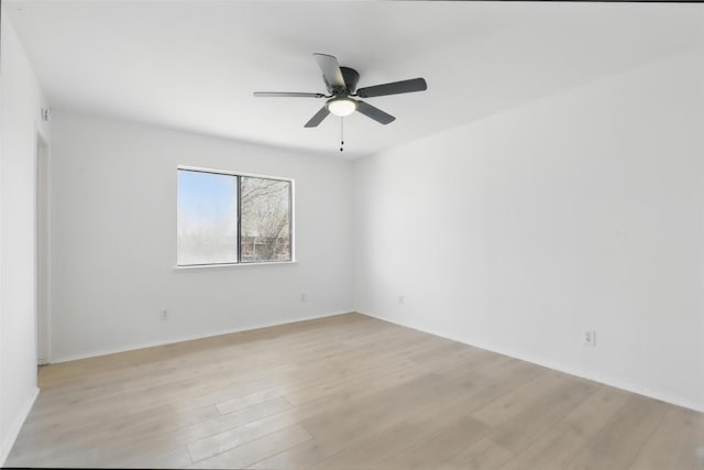 1329 Steinburg Ln, Fort Worth, TX 76134 - unfurnished room featuring light wood-style floors and a ceiling fan