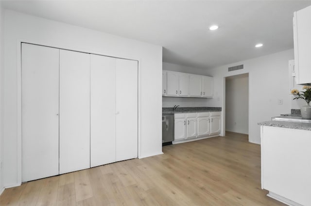 1329 Steinburg Ln, Fort Worth, TX 76134 - kitchen featuring light wood-style flooring, white cabinets, recessed lighting, visible vents, and dishwasher