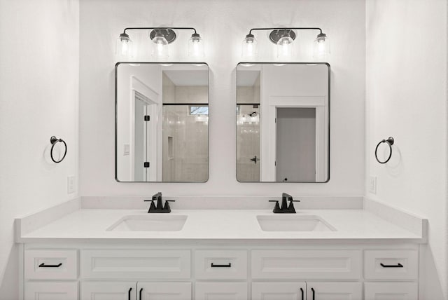bathroom with double vanity and a sink